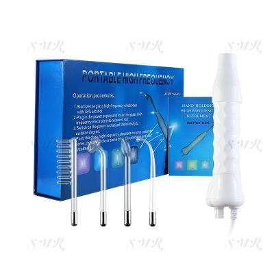 China Acne Treatment Handheld 4 in 1 High Frequency Treatment Ozone Acne Skin Care Magic Wand Therapy Facial Machine for sale