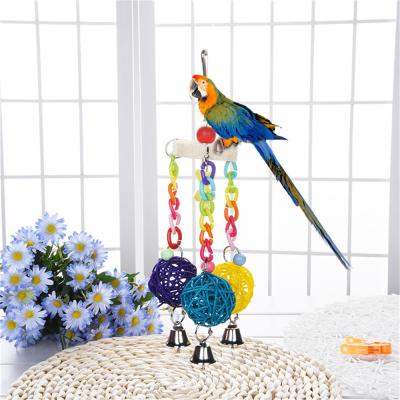 China Viable Multi Color Plastic Rattan Ball Bird Parrot Chain Hanging Toy With Jingle Bell for sale