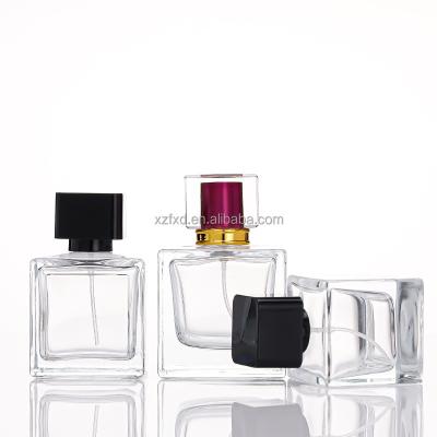 China Spot Square Cosmetic Perfume Bottles 50ml 100ml Thickening Perfume Glass Unique Empty Bottle Glass With Sprayer for sale