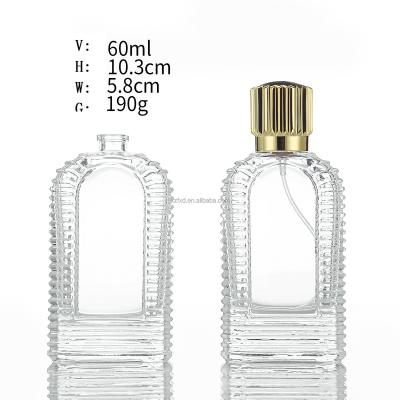 China Factory Direct Sales 60ml Clear Shape Gold Crown Cover Single Pump Sprayer Cosmetic Glass Perfume Bottle for sale