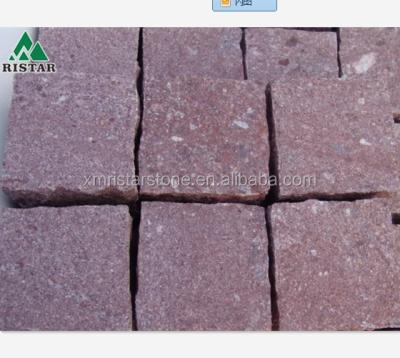 China Outdoor and Garden Paving Hot Sale Cheap Red Porphyry Cobblestone for sale