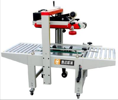 China Semi Automatic Food Carton Box Sealing Strip Machine for sale