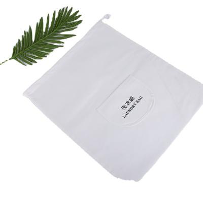 China Traditional Hot Sale Packing Small Nonwoven Drawstring Laundry Wash Bag for sale