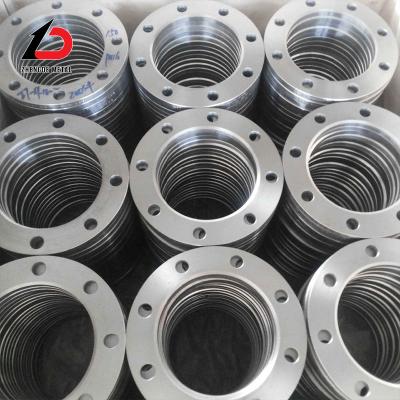 China Weld Neck Flange Manufacturers Pn0.25 Pn0.6 Pn2.5 Pn4.0 Stainless Steel/Carbon Steel/Alloy Flange Used for Metal Cutting Machine and Car Parts for sale