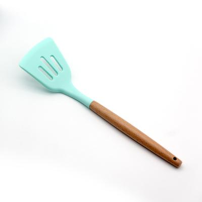 China Sustainable Hot Sale Silicone Slotted Turner Kitchen Ware Silicone Utensil With Wooden Slotted Turner Tools for sale