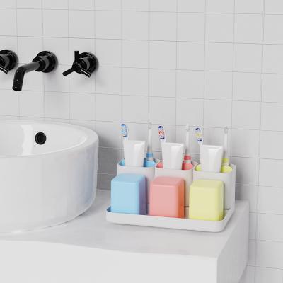 China Viable Bath Tray Countertop Storage Bathroom Toothbrushes and Toothpaste Caddy Accessories Organizer with Drain Design for sale