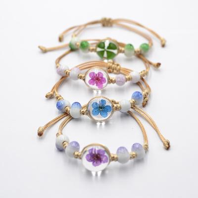 China Factory Flower Ethnic Features Dried Flower Bracelet Lace Flower Handwoven Slider Jewelry for sale