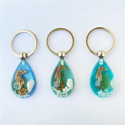 China Metal Key Chain, Water Drop, Marine Resin, Seahorse and Conch Pendants for sale