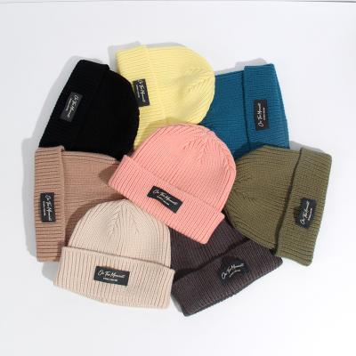 China Custom Knitted Beanies Winter Designer Logo Patch Fashion Hat Multi Color Tank Top Women Men's Hats for Adults for sale