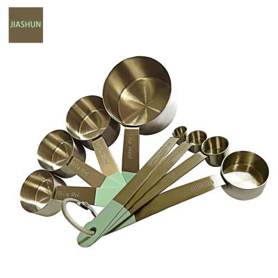 China Viable High Quality Classic Amazon Style Stainless Steel Bronze Color Measuring Cups Dosers for sale