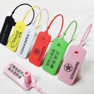 China Wholesale Custom Disposable Security Plastic Label Disposable Garment Seal Clothing Shoes And Clothing Bags Anti-Counterfeiting Seal for sale