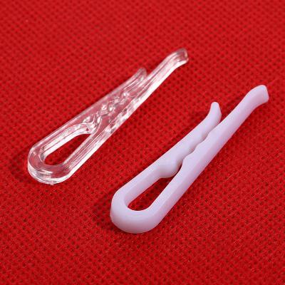 China Eco-friendly Material Wholesale Custom Toothed White R Shape Plastic Shirt Clips Small And Portable Plastic Clips For Clothes for sale