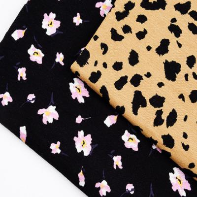 China Anti Pill modal spandex for T-shirt dress clothing material flower printed elastic jersey knitted fabric for sale