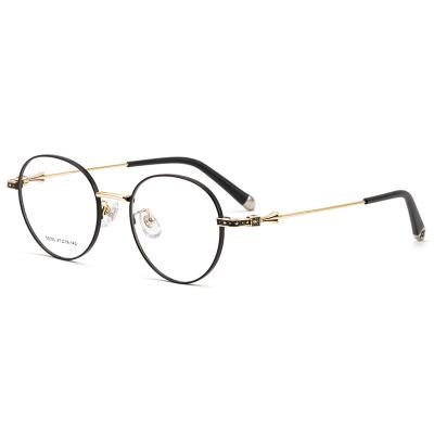 China Fashionable ultra-light 55050 men and women with retro decorative round glasses frame pure titanium optical frame for sale