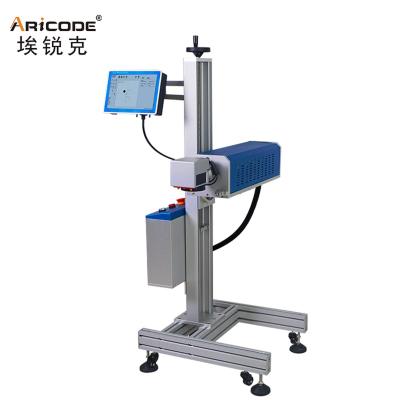 China Air Cooled High Speed ​​Date Number Printing Online Flying CO2 Laser Marking Machine For Pet Bottles Production Line for sale