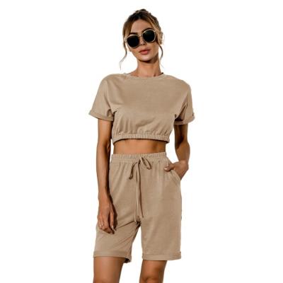 China Wholesale Breathable Tracksuit Crop Tops Foldable 2 Piece Sports Womens Tracksuits Shorts Sleeve Cuff Biker Set Tracksuit For Women for sale