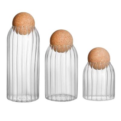 China Wholesale New Design Storage Jar Handmade Glass Containers With Round Cork Lid for sale