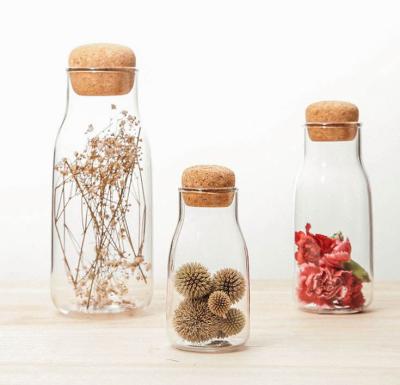 China Sustainable airtight hot sale high borosilicate glass jar for kitchen storage dry food with bamboo lid and cork lid for sale