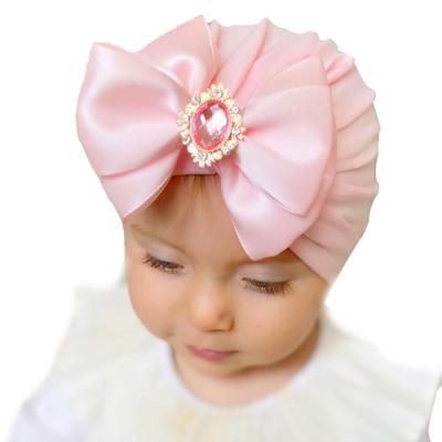 China European and American Style Baby Bowknot Hat Knitted Striped Baby Beanie Hat Cute Newborn Girl Hats for sale