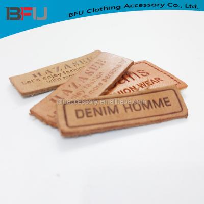 China Real viable custom high quality genuine debossed clothing leather patch for sale