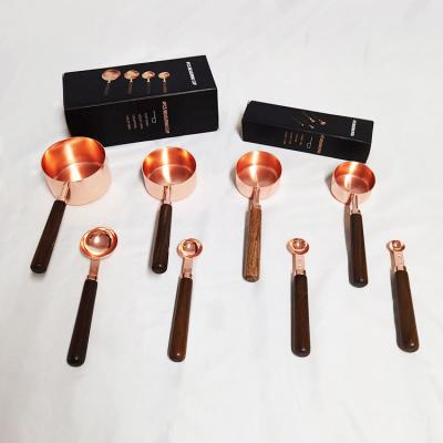 China Viable Kitchen Coffee Rose Gold Stainless Steel Walnut Handle Measuration Baking Measuring Cups And Spoons Set for sale