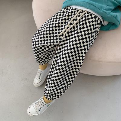 China Anti-pilling new boys and girls checkerboard plaid harem pants 1-7 years old all-match cotton unisex loose pants for sale