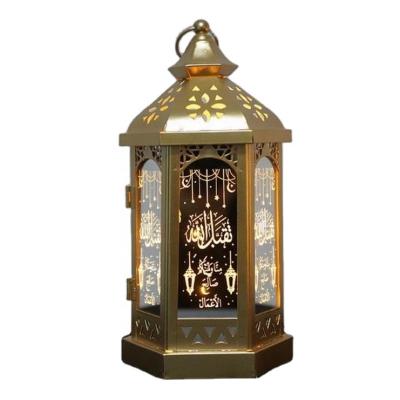 China Arabic Ramadan Mubarak Topper Ornaments Hollow Out Golden Ramadan Style LED Lantern Table For Eid Party Decor, for sale