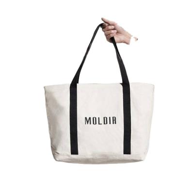 China 2021 customs wholesale logo cotton canvas fabric reusable packaging shopping bag for sale