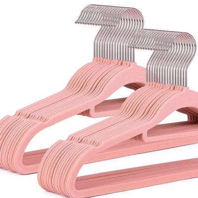 China Modern Wholesale Space Saving Baby Hanger Kids Thin Plastic Velvet Pink Clothes Hanger for sale