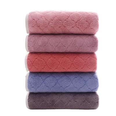 China Viable Wholesale Color Velvet Polyester Towel Striped Coral Bath Towel for sale