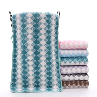 China Viable Wholesale Color Velvet Polyester Towel Striped Coral Bath Towel for sale