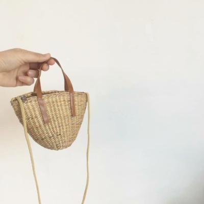 China Vintage Summer Hand - Woven Children Handbags Vintage Infant Girls Straw Beach Bags for sale