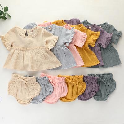 China Breathable Adorable Muslin Cotton Clothes Babies Ruffle Short Sleeve Top Bloomers Set for sale