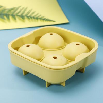 China Viable Ice Ball Maker 4-Hole Reusable Silicone Ice Cube Tray For Home Whiskey for sale