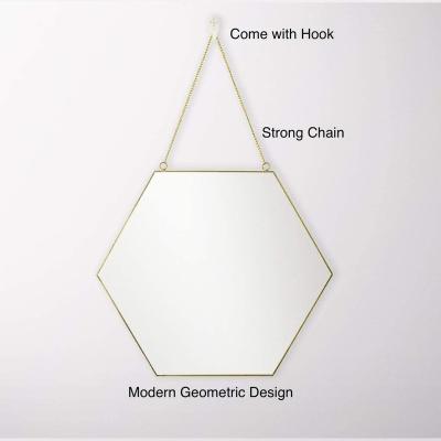 China Custom Antique Gold Frame Gold Hexagon Wall Hanging Brass Mirror Decorative Minimalist for sale