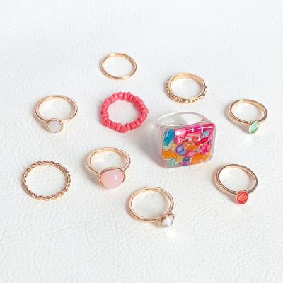 China FASHIONABLE Jingle YI Wholesale Fashion Gold Plated Resin Finger Rings Jewelry 10 PCs/set for sale