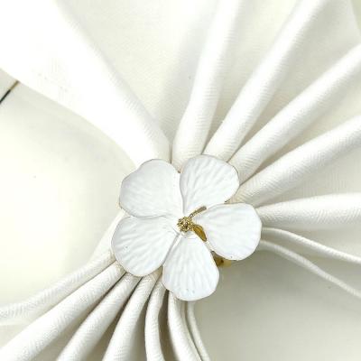 China Wholesale Viable Metal Napkin Ring Holder Artificial Flowers Plum Blossom Floral White Napkin Rings For Souvenir Wedding Elegant for sale