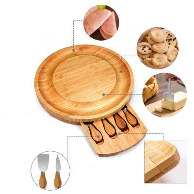 China 100% Natural Cheese Sustainable Bamboo Board With 3 Piece Cutlery Set Cheese Tray Hidden Cutlery Drawer for sale