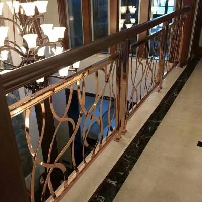 China Hotel Curved Staircase Stainless Steel Laser Cut Design Railing for sale