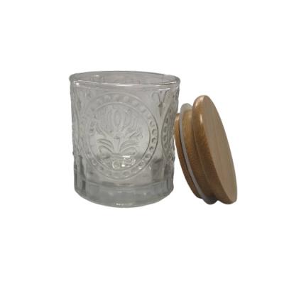 China Custom Eco-Friendly Wholesale Unique Luxury Decorative Clear Crystal Glass Empty Scented Candle Home Decor Small Jars With Wooden Lids for sale