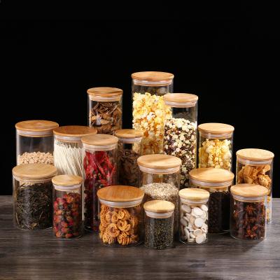 China Eco-friendly Cookie Candy Heatable Honey Food Borosilicate Glass Storage Jar With Airtight Bamboo Lid for sale