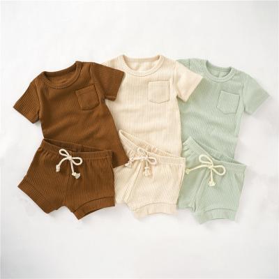 China Factory Wholesale 100% Cotton Solid Color Summer Pajamas Suits Short Sleeve Baby Pajamas Sets Toddler Clothes for sale