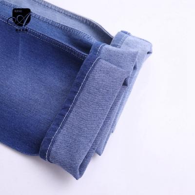 China Wholesale anti-static cheap 8.5oz denim textile twill OE price blue cholesterol cotton twill fabric for pants for sale