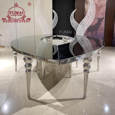 China Modern EYE Shape Silver Frame Stainless Steel Glass Top Wedding Hall Table for sale