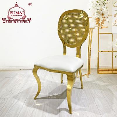 China Modern Wedding Furniture Design Hole Stainless Steel Gold Round Back Dining Chair for sale