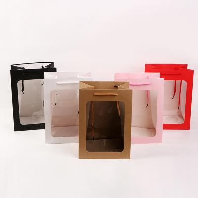 China New Creative Recyclable Handbag Square Bottom Paper Flower Packaging Gift Bag for sale