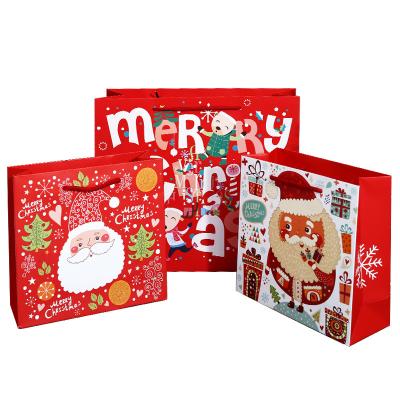 China Wholesale High Quality Recyclable Christmas Santa Shopping Bag Folding Christmas Paper Bag for sale