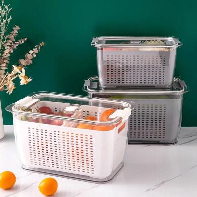 China Transparent Freshness Preservation Refrigerator Organizer Bins Refrigerator Storage Bins Storage Box With Drain Basket for sale