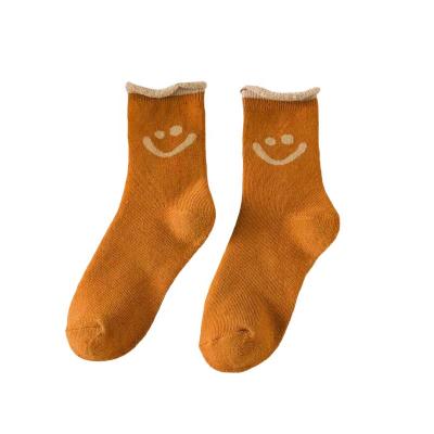 China Custom Made Breathable Unisex Warm Winter Socks Jacquard Embroidery Sport Booties Soft Cupcake Sleep Tube Thermal Socks for sale