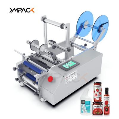 中国 YM130 Manual Round Bottle Labeling Machine Semi-auto Label Applicator For Round Bottle 販売のため